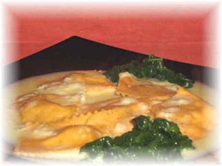ravioli di zucca in fonduta con spinaci