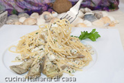 spaghetti con gallinella di mare e carciofi